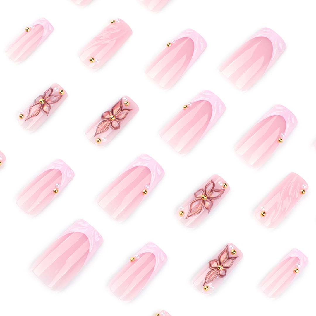 Artistic acrylic nails with flower design and glitter variations Stornfield