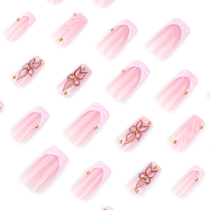 Artistic acrylic nails with flower design and glitter variations Stornfield