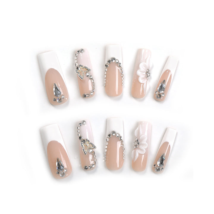 Artificial nail set with elegant glitter and flower motifs Stornfield