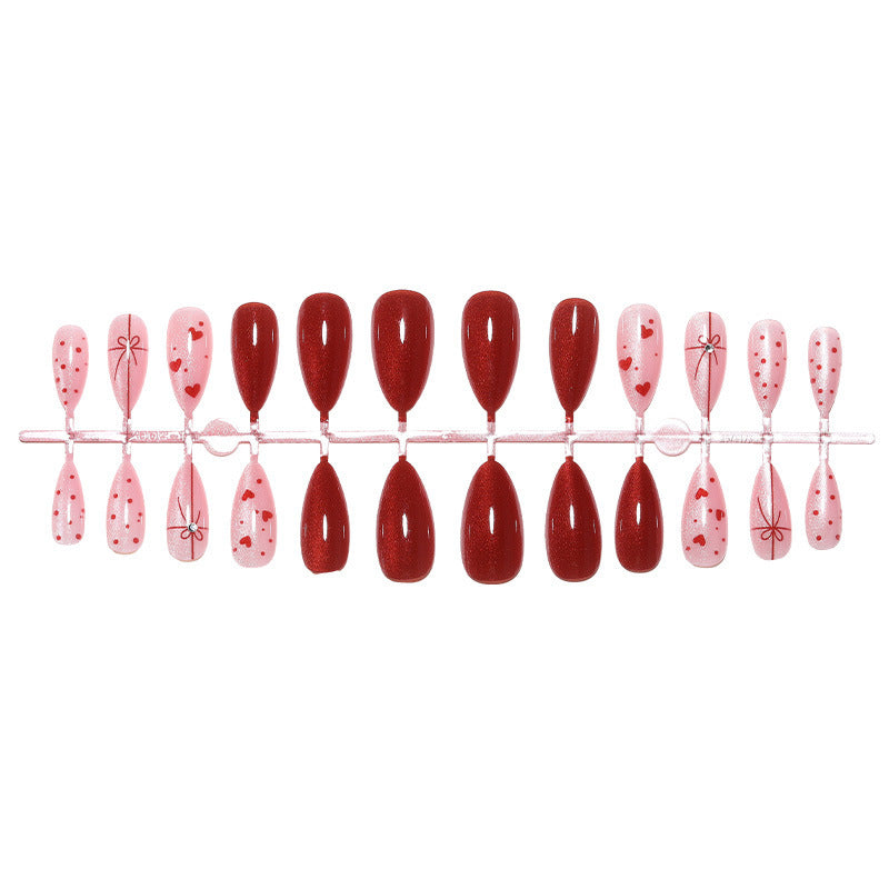 Artificial nail set with romantic heart and glitter designs Stornfield