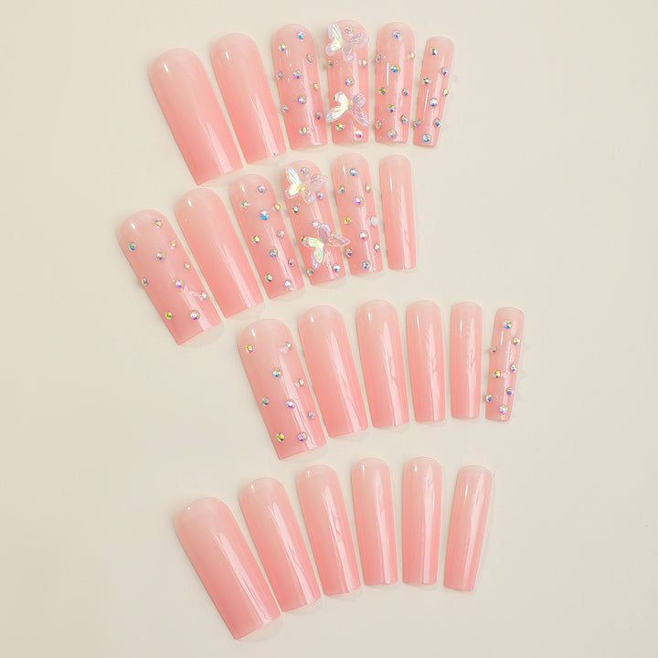 Artificial nail tips with glamorous rhinestone and butterfly designs Stornfield