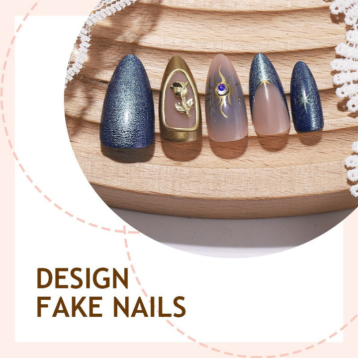 Artificial nail set with elegant gold and blue accents Stornfield
