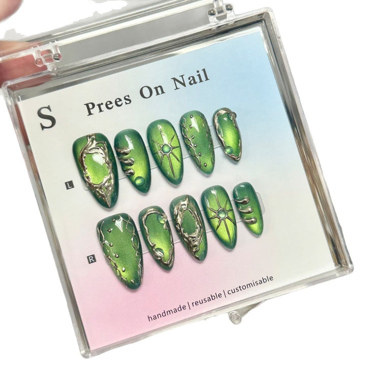 Artistic Press-On Nail Set with Unique Metallic Accents