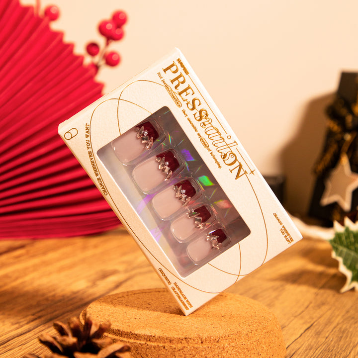 Artful nail extensions with glitter and jewelry embellishments Stornfield