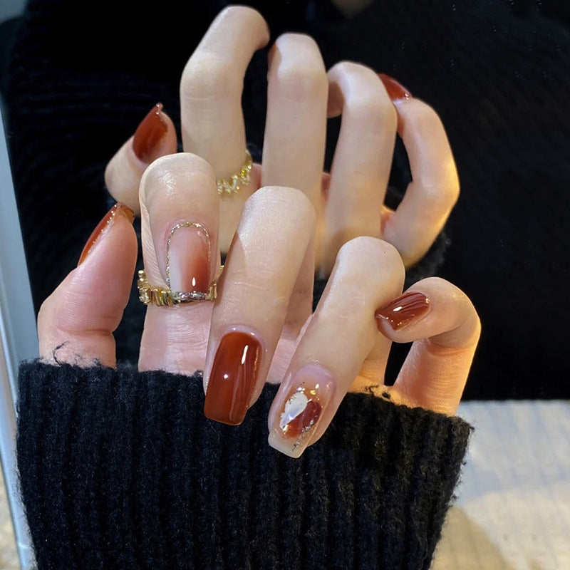 Elegant Glossy Press-On Nails with Gold Glitter Accents Stornfield