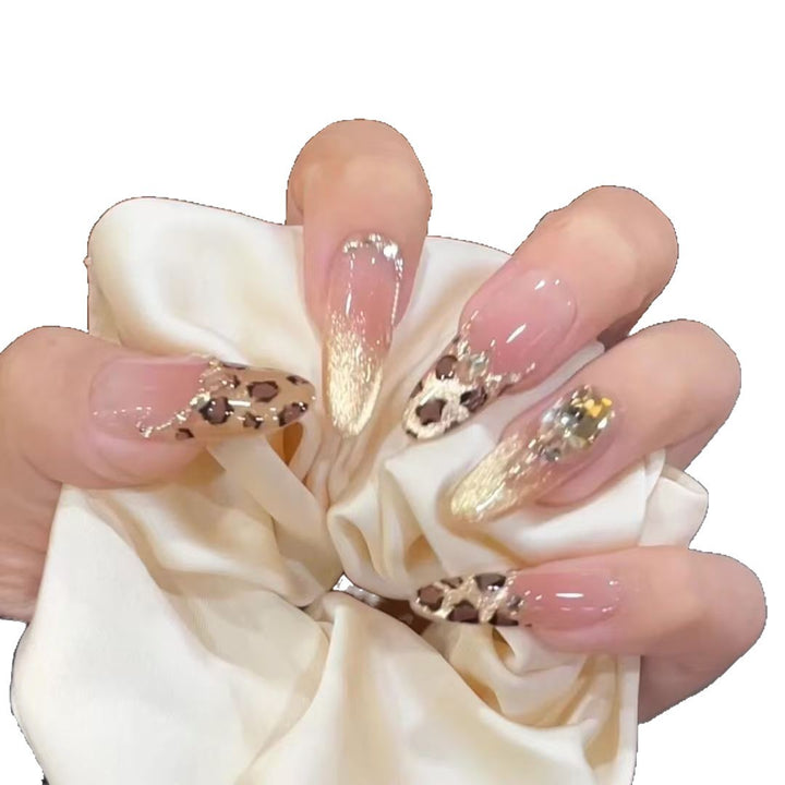 Artificial nails with elegant leopard design and glitter effects Stornfield