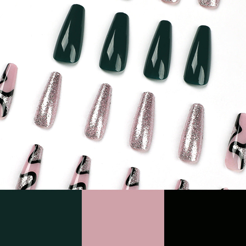 Artificial nail art with elegant glitter and gradient effects Stornfield