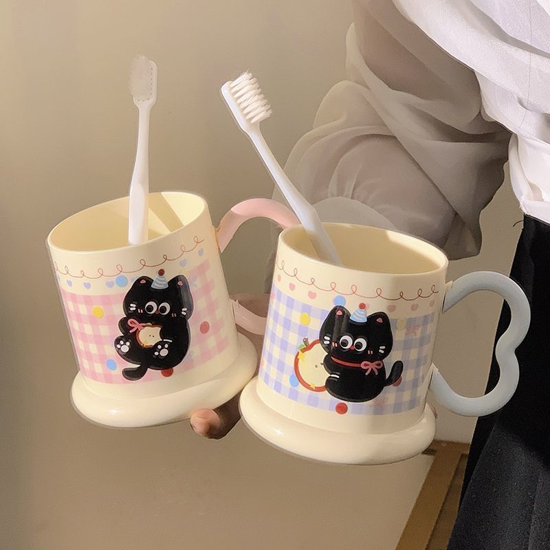 Ceramic mug with playful cat motif Stornfield