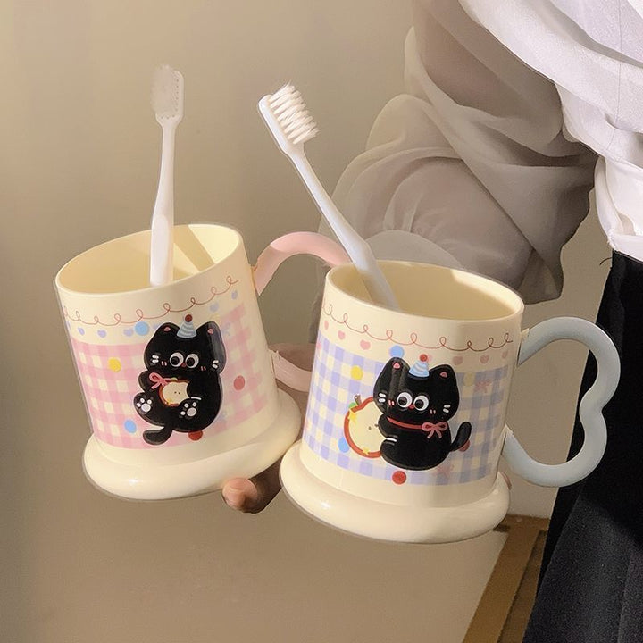 Ceramic mug with playful cat motif Stornfield