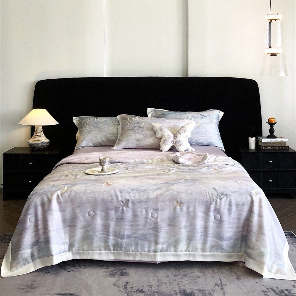 Luxurious satin bedding set with butterfly embroidery and decorative pillow