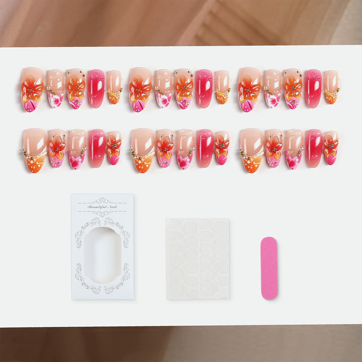 Artificial nail set with floral designs and elegant embellishments Stornfield