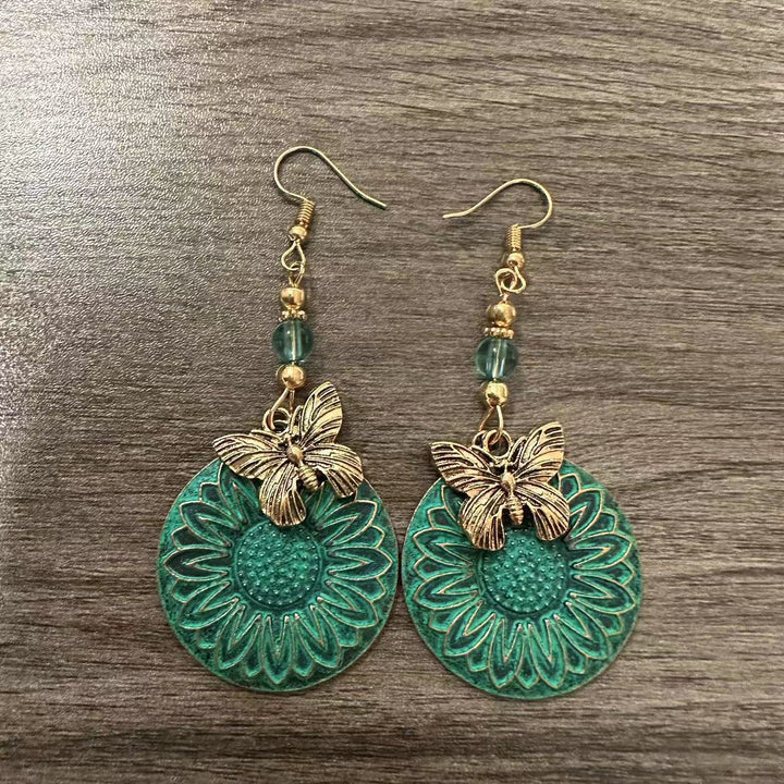 Elegant earrings with floral motif and butterflies Stornfield