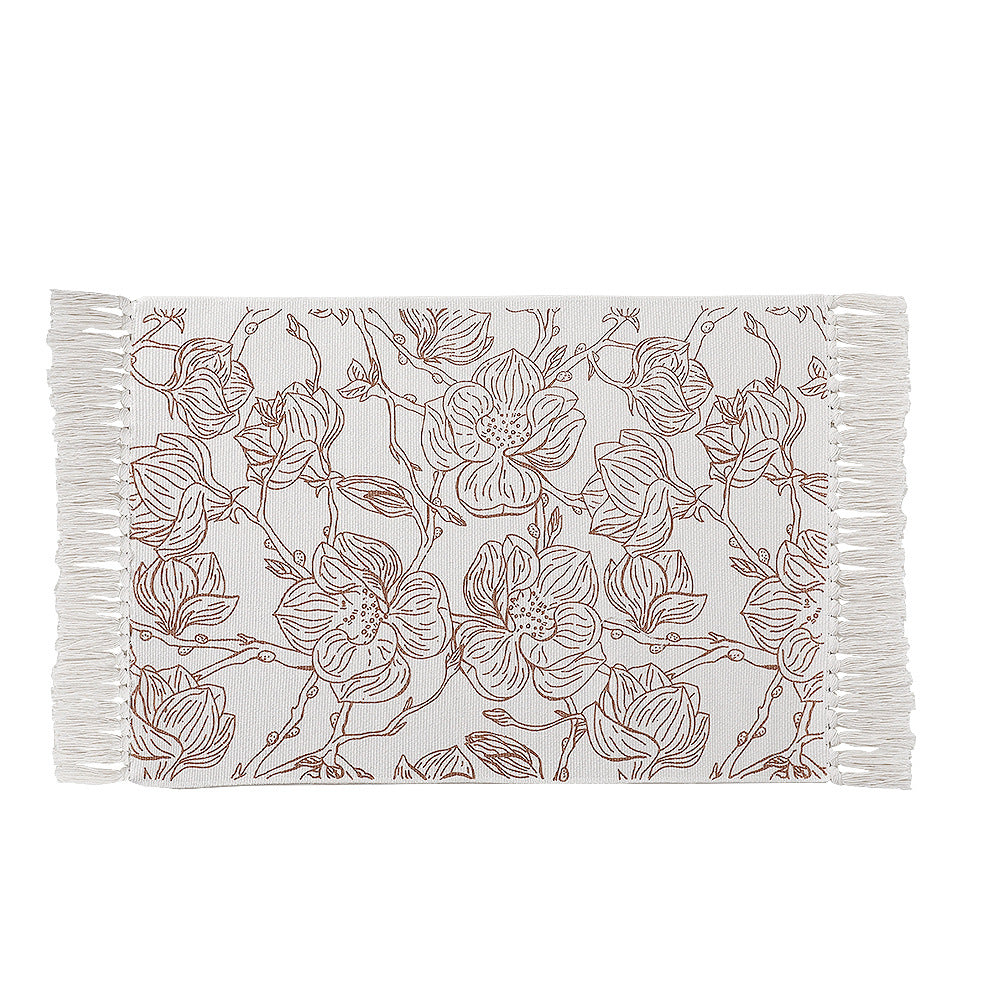 Woven table runner with botanical bird print and decorative fringes
