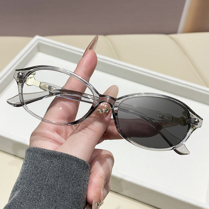 Women's fashionable optical glasses in elegant oval design with golden accents Stornfield