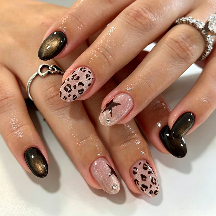 Artificial nails in modern animal print design Stornfield