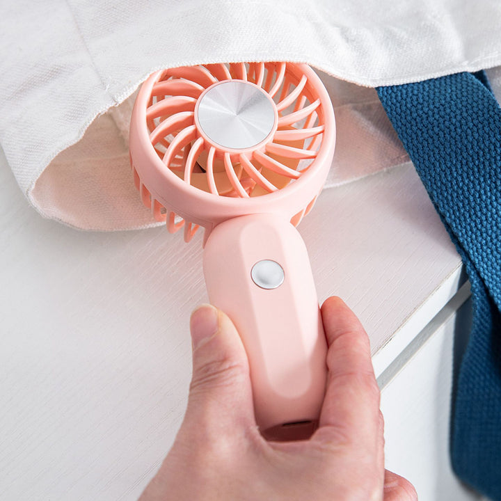 Women's portable mini fan with ergonomic grip technology Stornfield