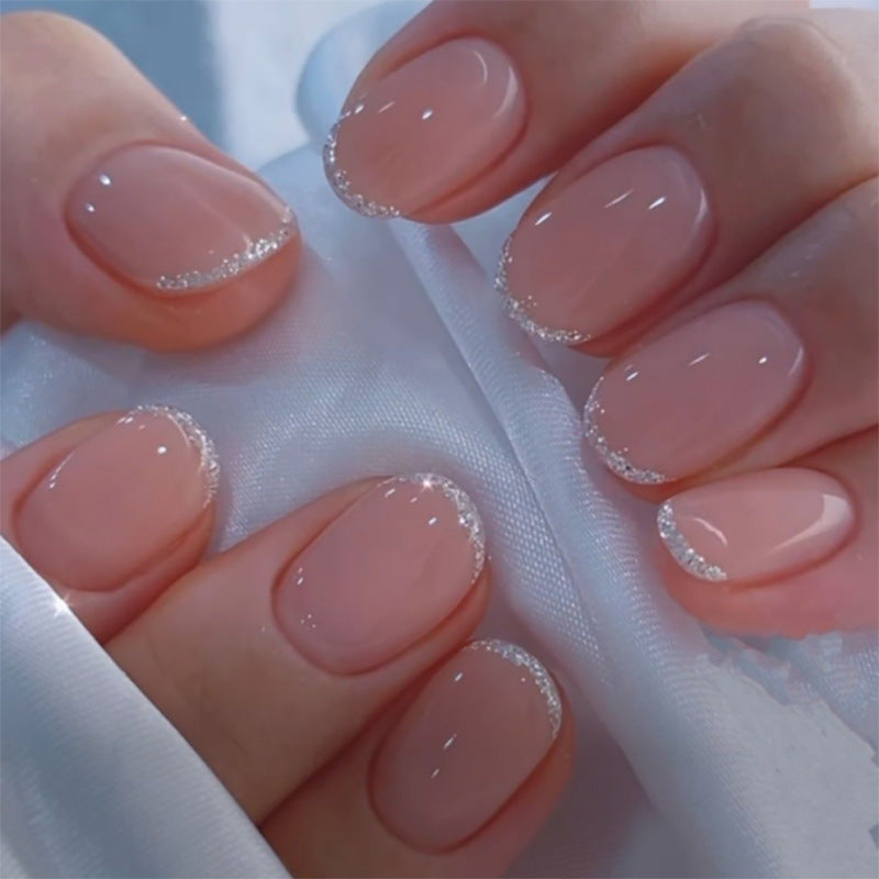 Artful stiletto nails with glitter accents Stornfield