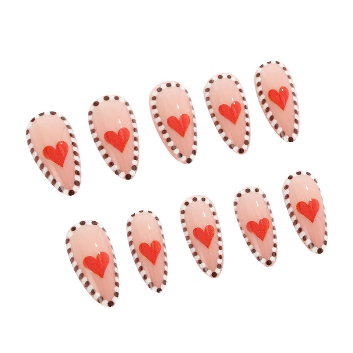 Artificial nails with heart-shaped accents Stornfield