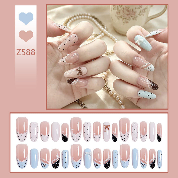 Artificial nail set with elegant accents and fine designs Stornfield
