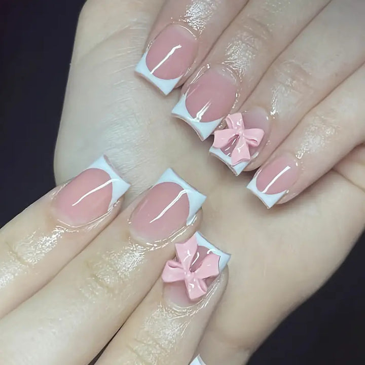 Elegant French Tip Press-On Nails with Bow Detail Stornfield