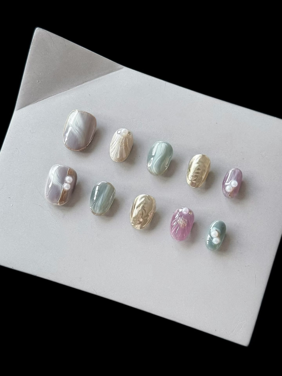Artistic Press-On Nail Set with Pearl and Marble Accents