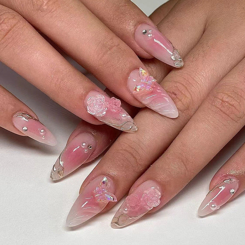 Artificial nails with delicate rose design and glitter accents Stornfield