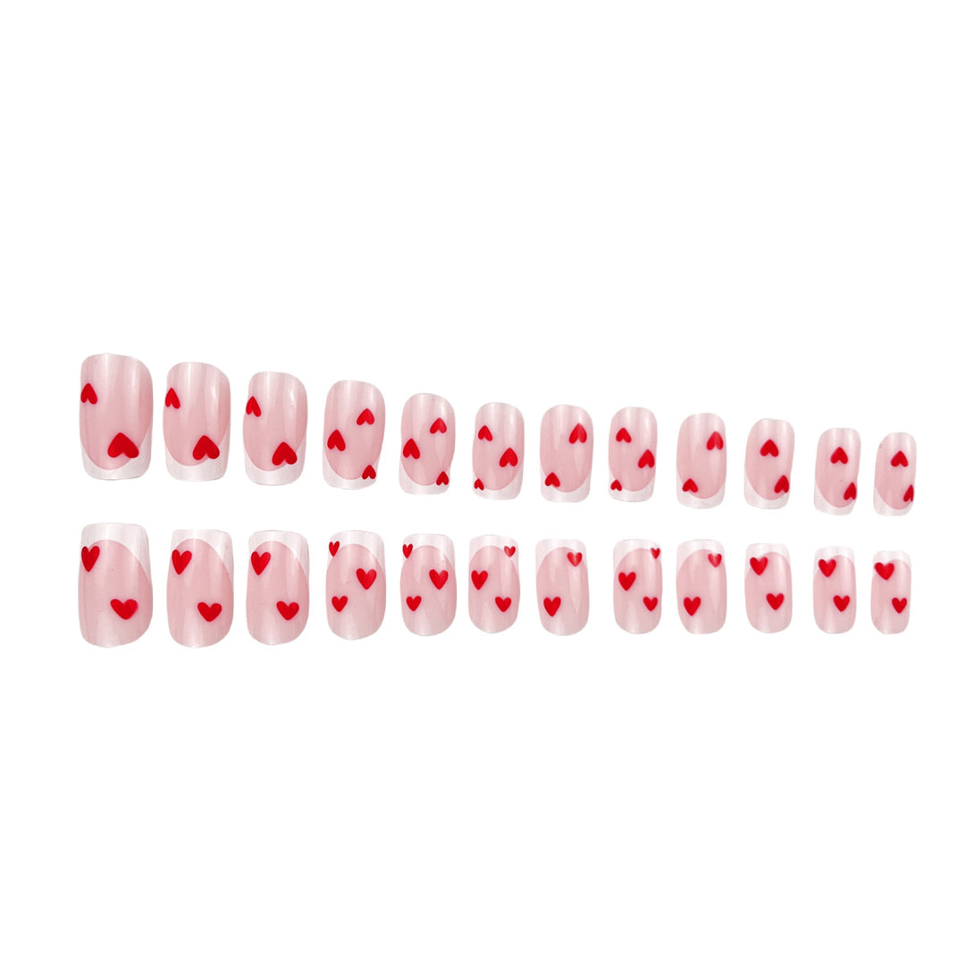 Heart-Embellished French Tip Nail Art Stornfield