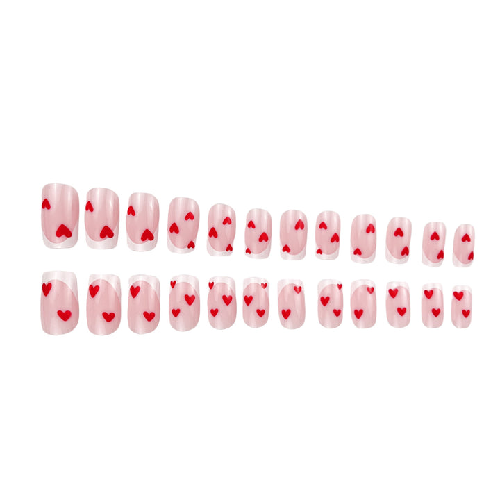 Heart-Embellished French Tip Nail Art Stornfield