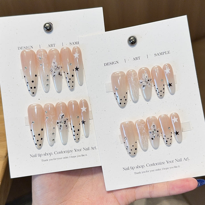 Acrylic Nails Set with Creative Designs and Shimmering Accents Stornfield