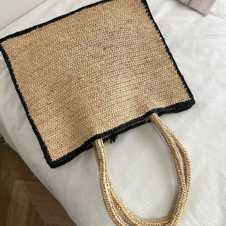 Handcrafted knitted bag with floral design Stornfield