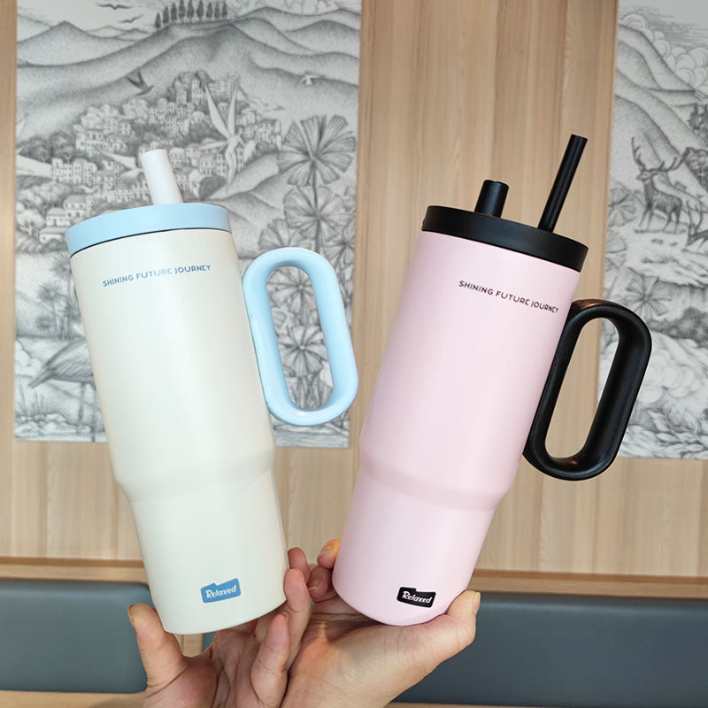 Women insulated drinking container with ergonomic handle Stornfield