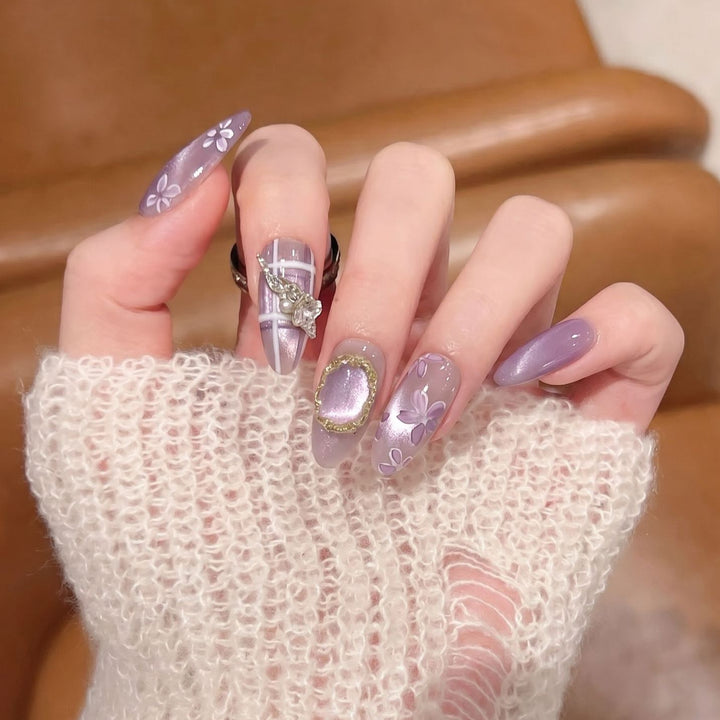 Artistic Press-On Nail Set with Floral Accents Stornfield