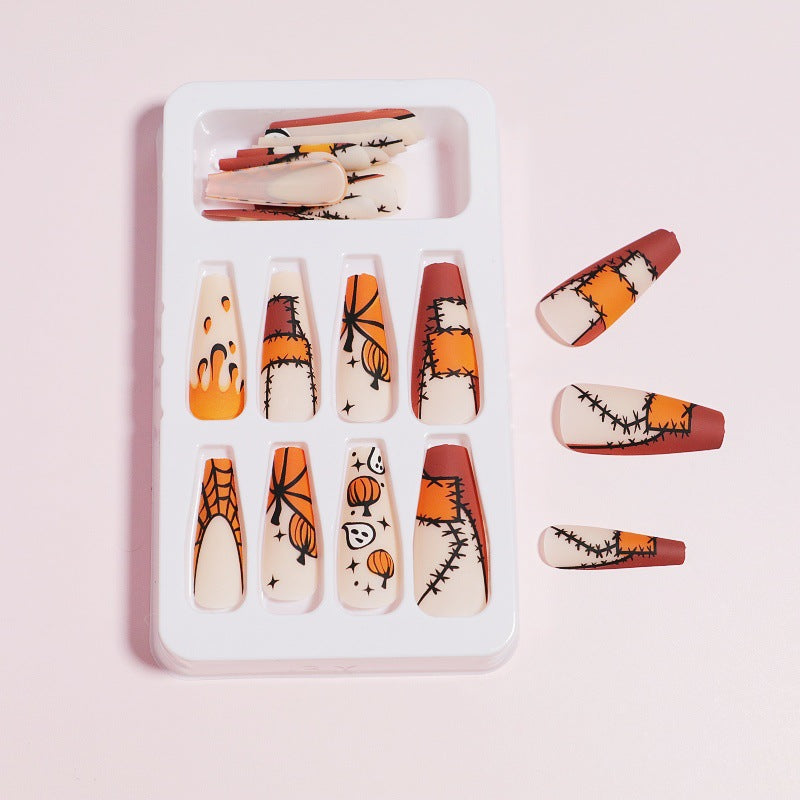 Artistic Press-On Nail Design with Dripping Effect Stornfield