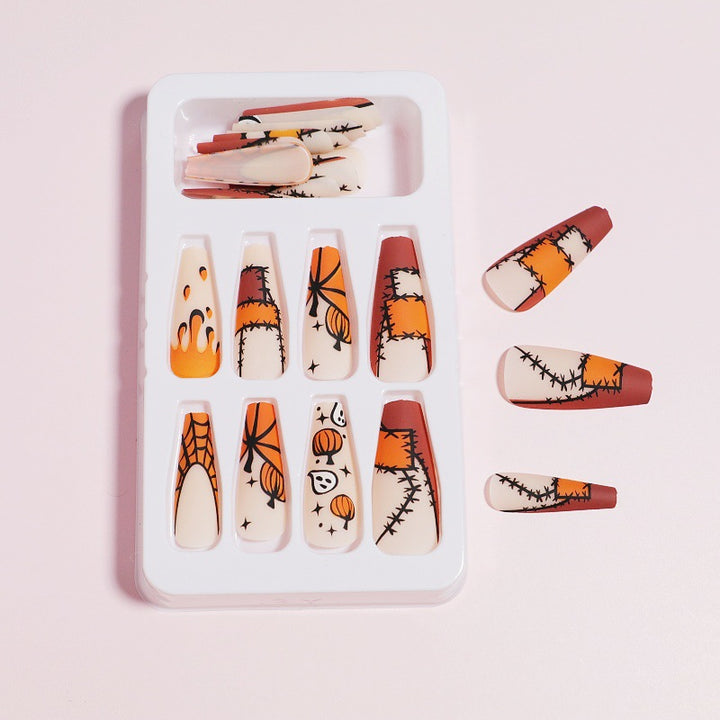 Artistic Press-On Nail Design with Dripping Effect Stornfield
