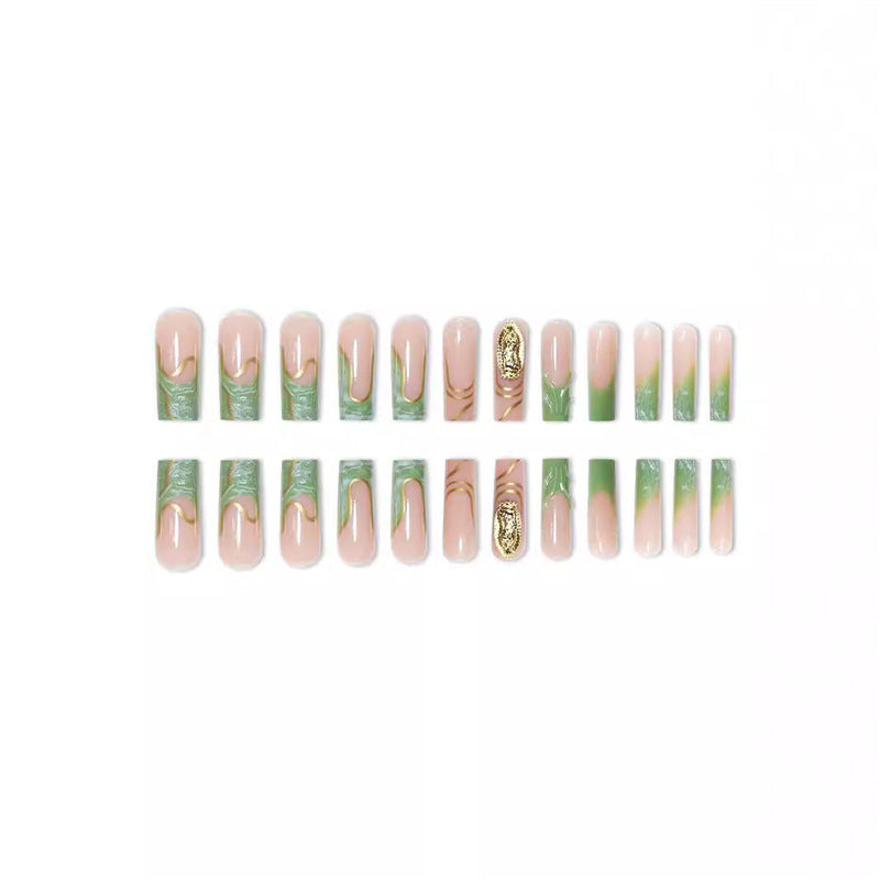 Artistic Press-On Nail Extensions with Gold Detailing Stornfield