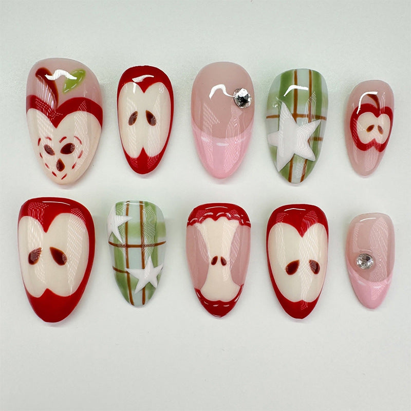 Artificial nail set with cheerful apple and star pattern Stornfield