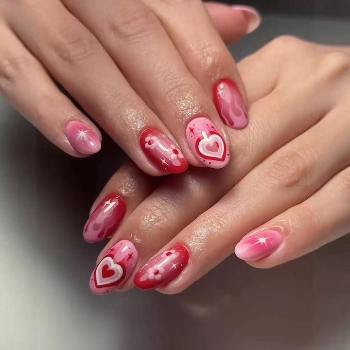 Artificial nail set with romantic heart design and sparkling accents Stornfield
