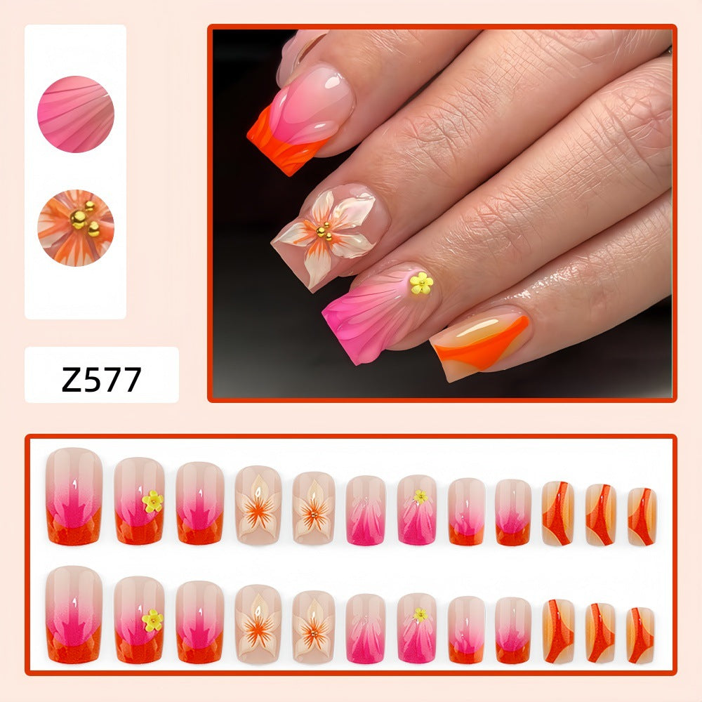 Artificial nails with floral 3D designs and gradient color Stornfield