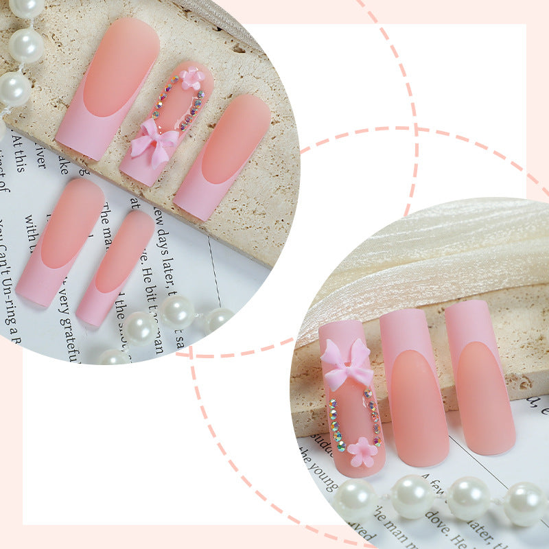Decorative Press-On Nail Art with Floral and Bow Accents Stornfield