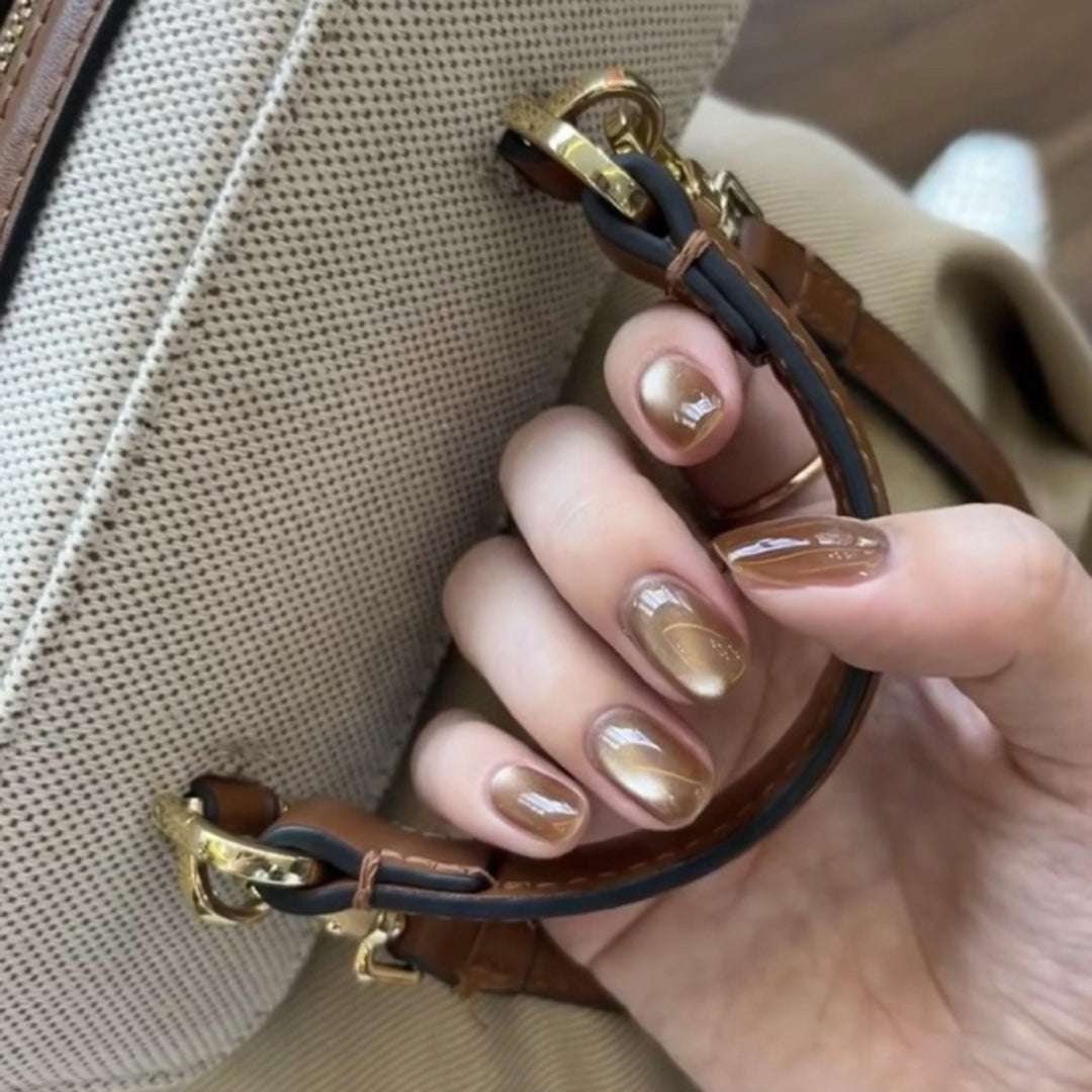 Elegant Nail Art with Glitter Decorations Stornfield