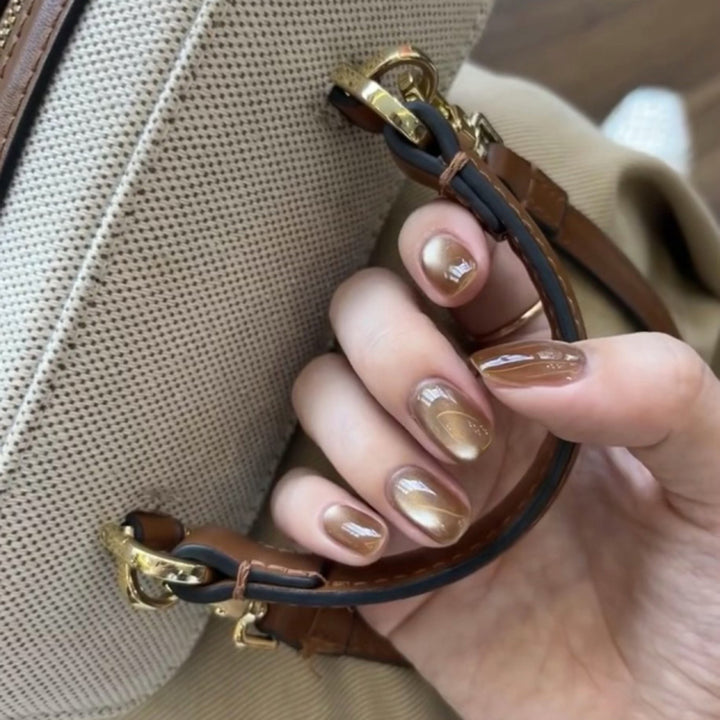 Elegant Nail Art with Glitter Decorations Stornfield