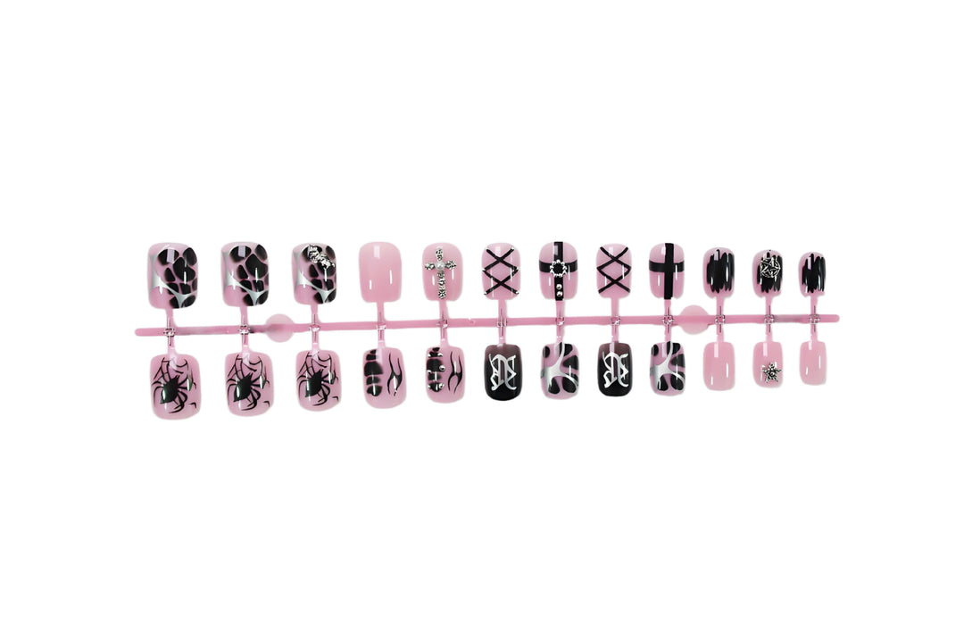 Nail art set with creative Halloween motifs and glamorous accents Stornfield
