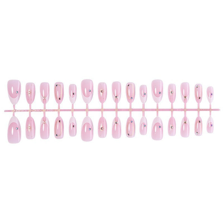Artificial nail set with elegant lace design and glamorous accents Stornfield