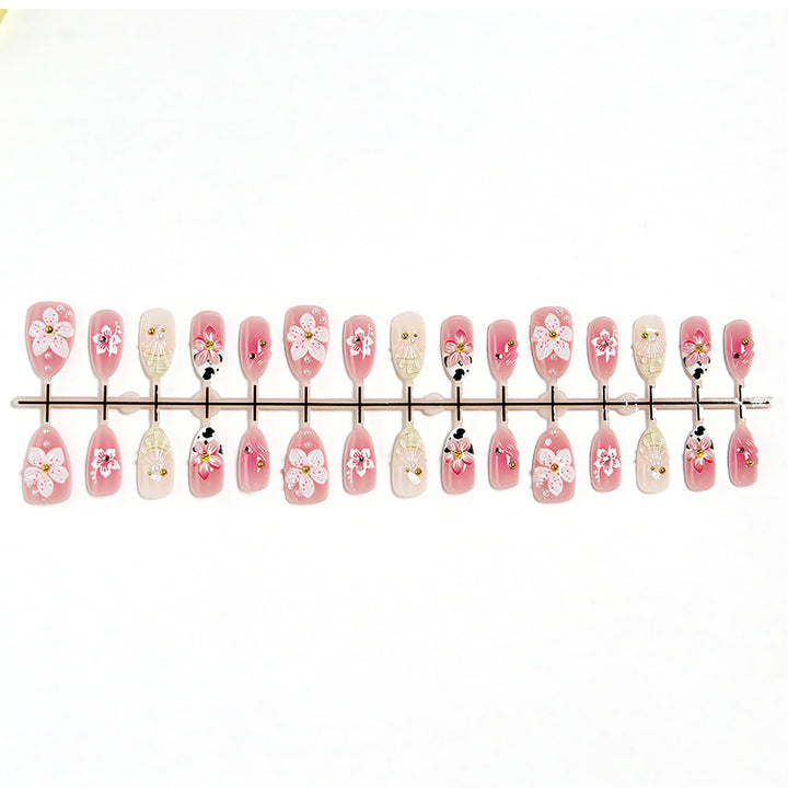 Luxurious artificial nails with floral decorations Stornfield