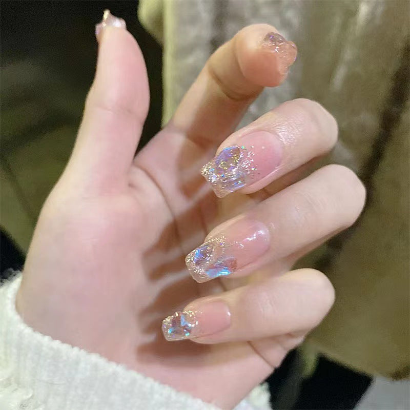 Artificial nails with heart accent and glamorous decorations Stornfield
