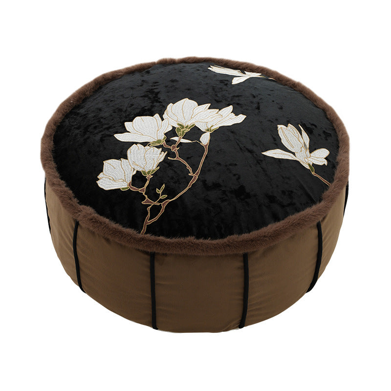 Round upholstered velvet floor cushion pouf with faux fur trim and handle Stornfield