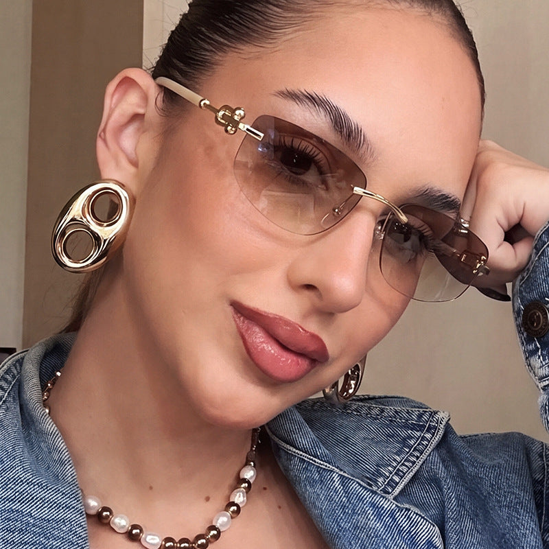 Ladies elegant semi-rimless glasses with luxurious metal frame and transparent lenses Stornfield