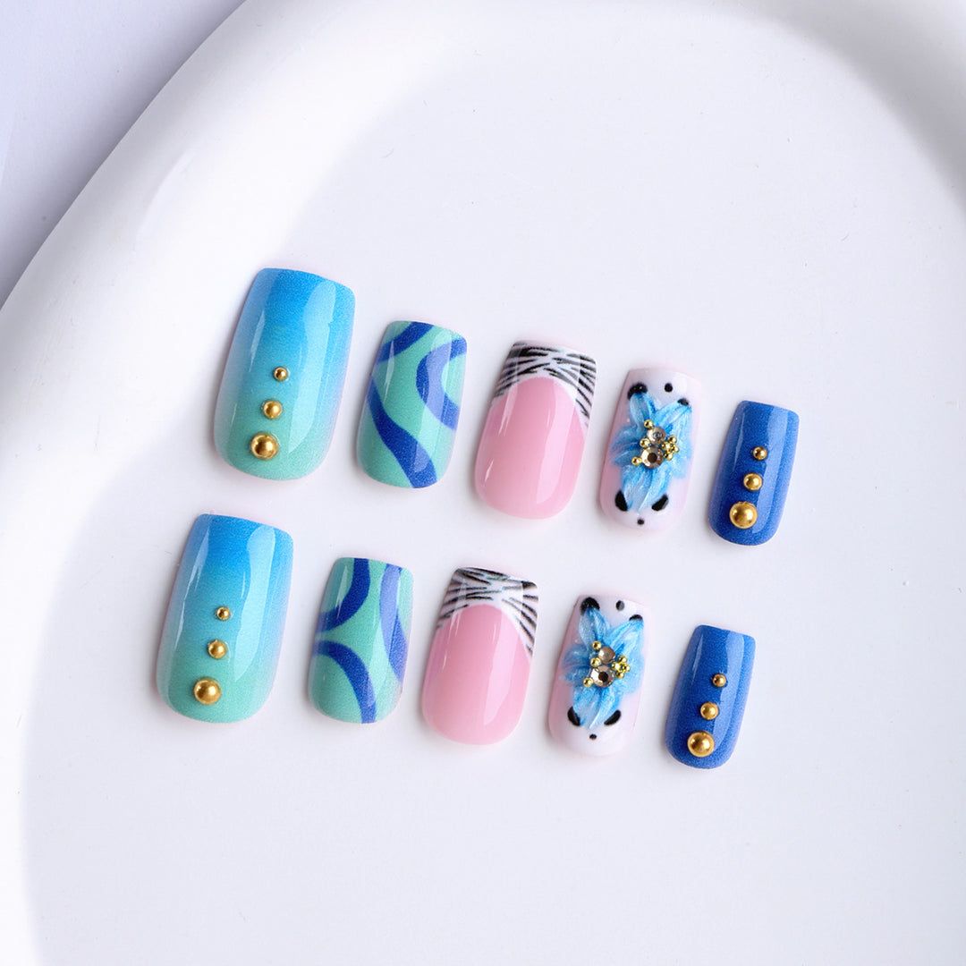 Artificial fingernails with handcrafted designs Stornfield