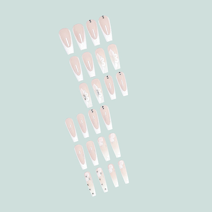 Glamorous stiletto artificial nails with floral details Stornfield