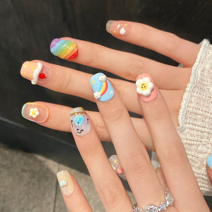 Whimsical Press-On Nail Art Set with Cartoon Designs